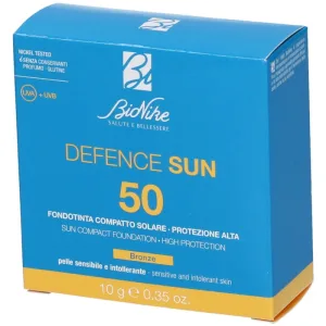 Defence sun 50 fond de ten compact n2 bronz 10 g
