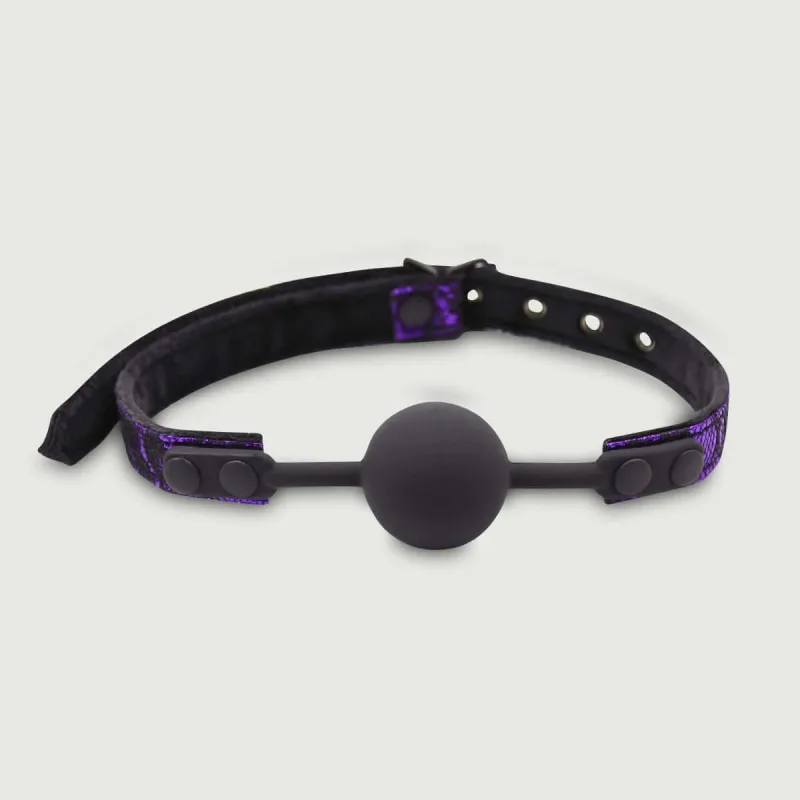 Gag cu bilă de silicon și curea cu sclipici - negru/violet — preț și oferte