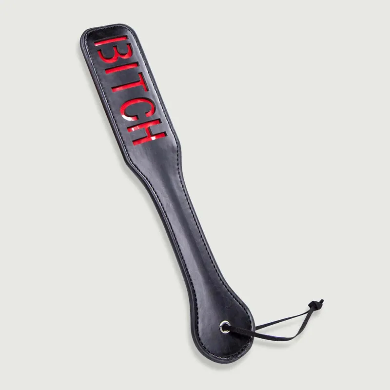 Domme Series Paletă din piele cu decupaj BITCH - negru — preț și oferte