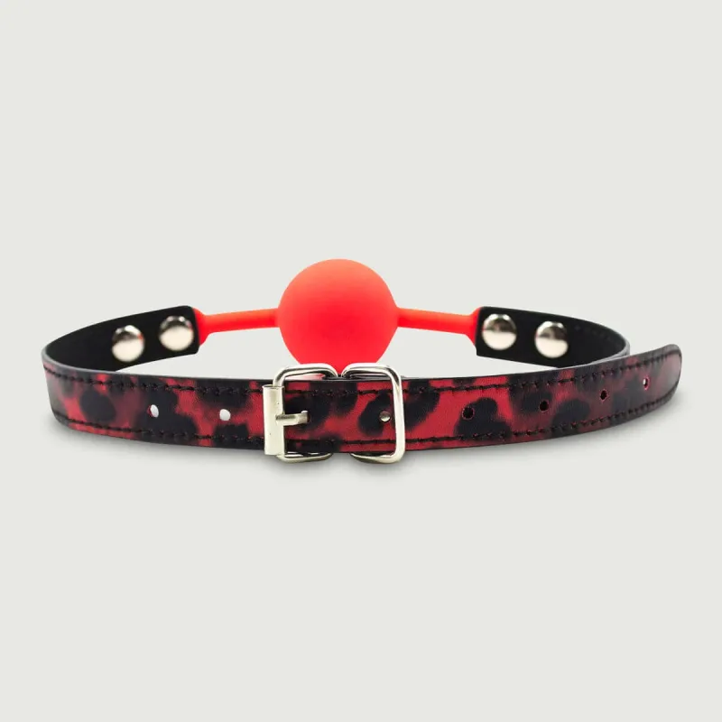 Căluș cu bilă din silicon cu curea animal print - roșu — preț și oferte