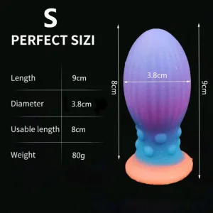 Plug anal mic din silicon, în formă de ou, care strălucește în întuneric, cu ventuză, 9 x 3,8 cm – Multicolor